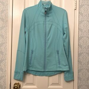 Lululemon Define jacket. Good condition. Detailed back,zippered pockets.